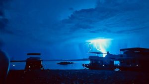 Lightning striking on Lake Powell with 7th Street Treatment Center getting better